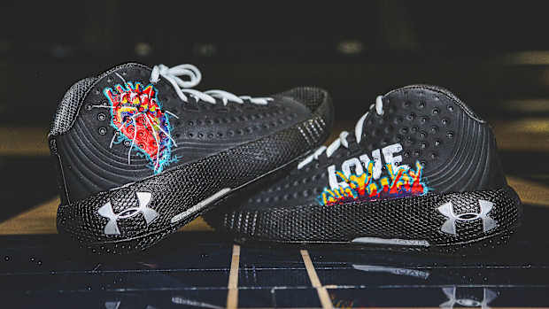 Shoes painted by Kamika Perry for Notre Dame